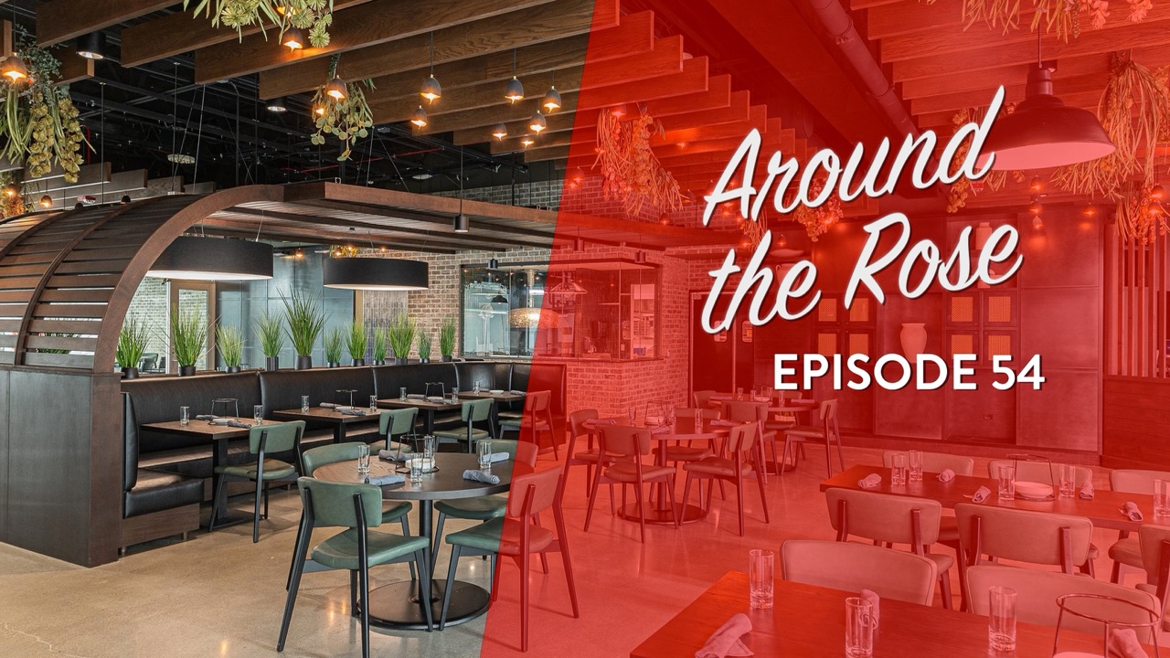 Modern restaurant interior with wooden accents and green plants on the left; text overlay on the right reads Around the Rose, Episode 54 in white letters on a red background.
