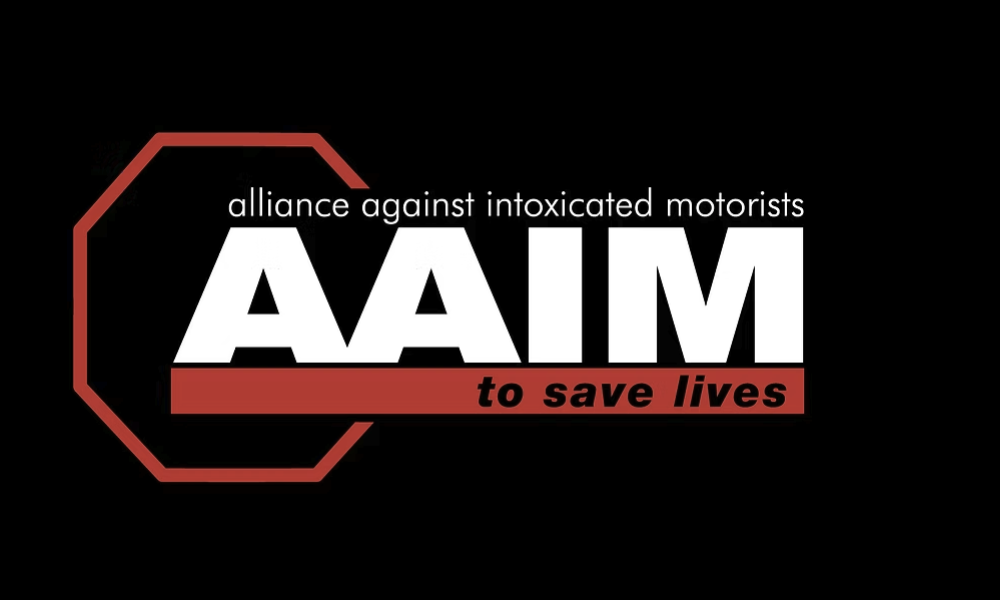 AAIM logo with the words alliance against intoxicated motorists above AAIM and to save lives in red below, set against a black background with a red stop sign outline.