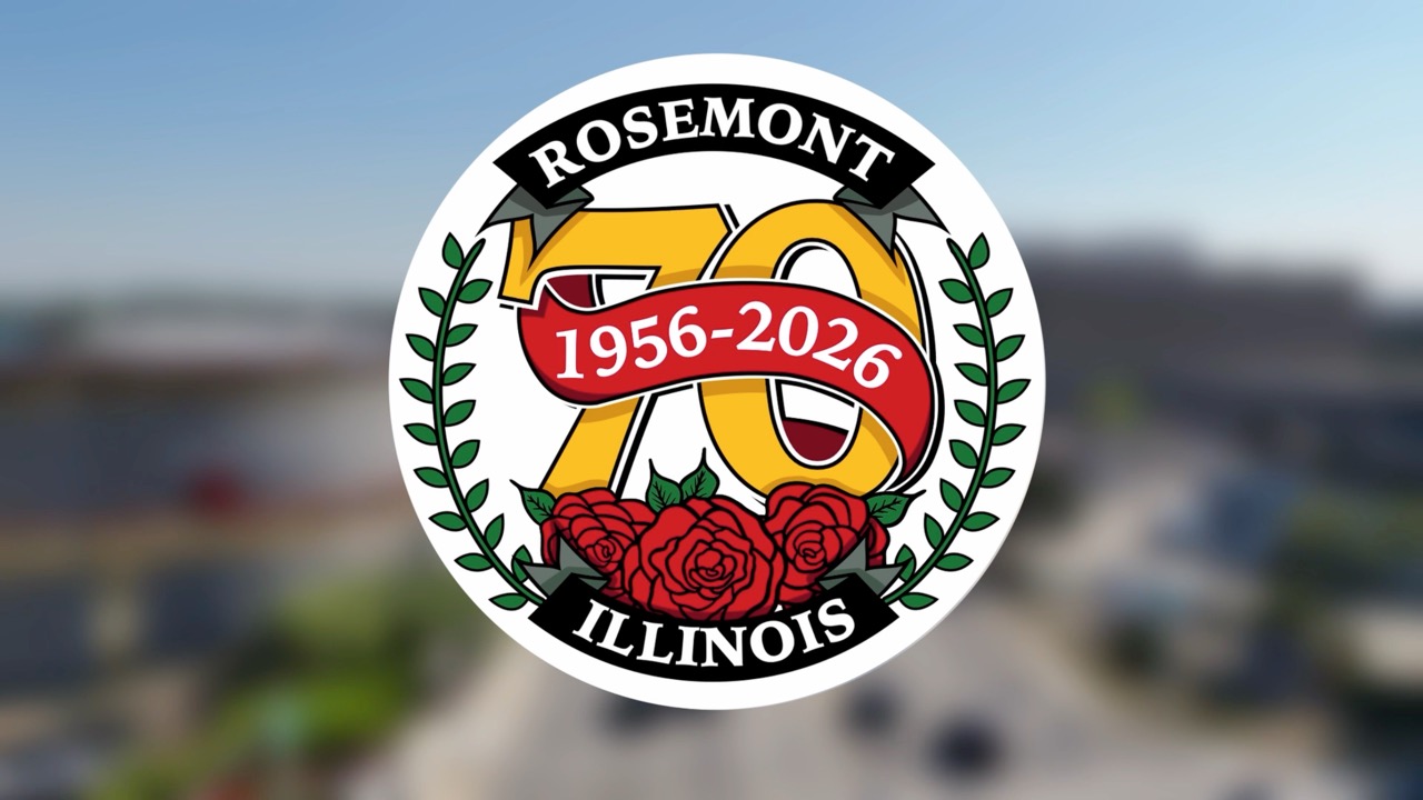 Circular logo with Rosemont Illinois, 70, 1956-2026, red roses, and green laurel branches, marking Rosemont, Illinoiss 70th anniversary.