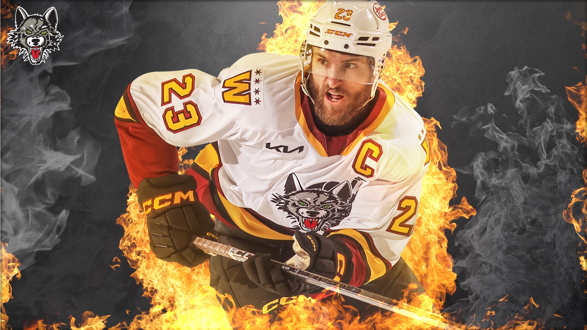 A hockey player in a white and maroon uniform with the number 23 and a captains C is surrounded by flames, holding a hockey stick, with a wolf logo on his chest and in the top left corner.