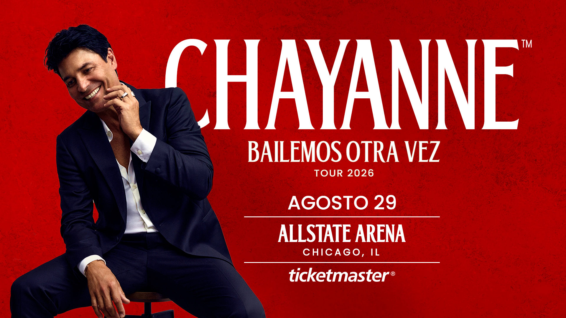 Chayanne sits smiling on a stool against a red background, promoting his “Bailamos Otra Vez” 2026 tour, with event details for August 29 at Allstate Arena in Chicago, IL.